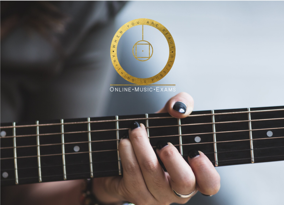 A promotion for online music exams with a close up of someone playing an acoustic guitar.