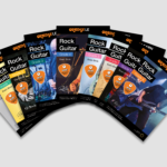 Display of Orange Learn course books for the 'Learn Rock Guitar' course